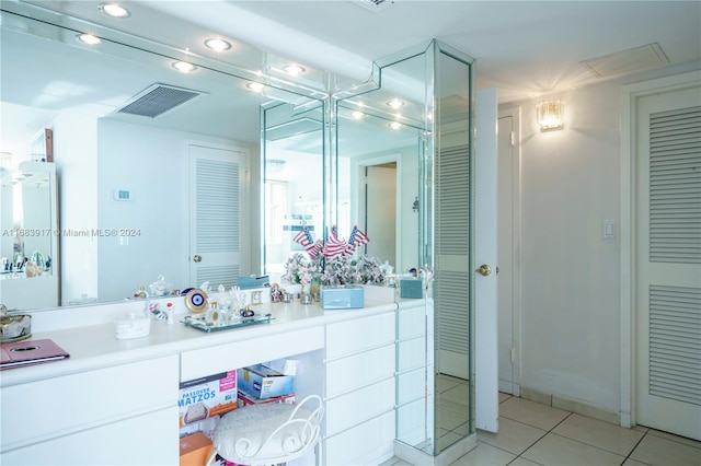 bathroom featuring vanity and tile patterned floors