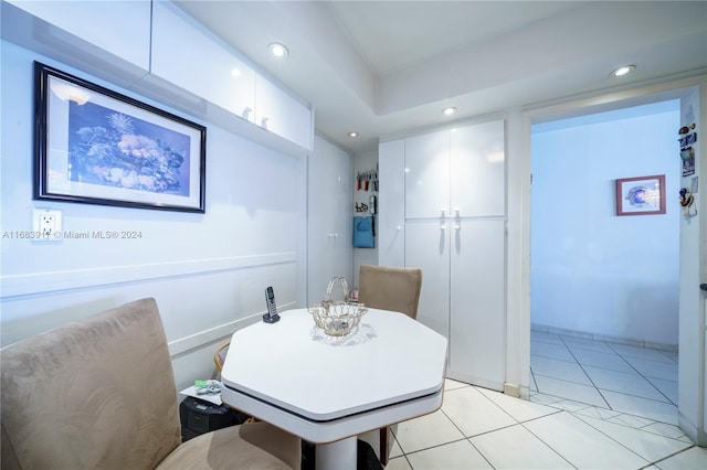 dining space with light tile patterned floors