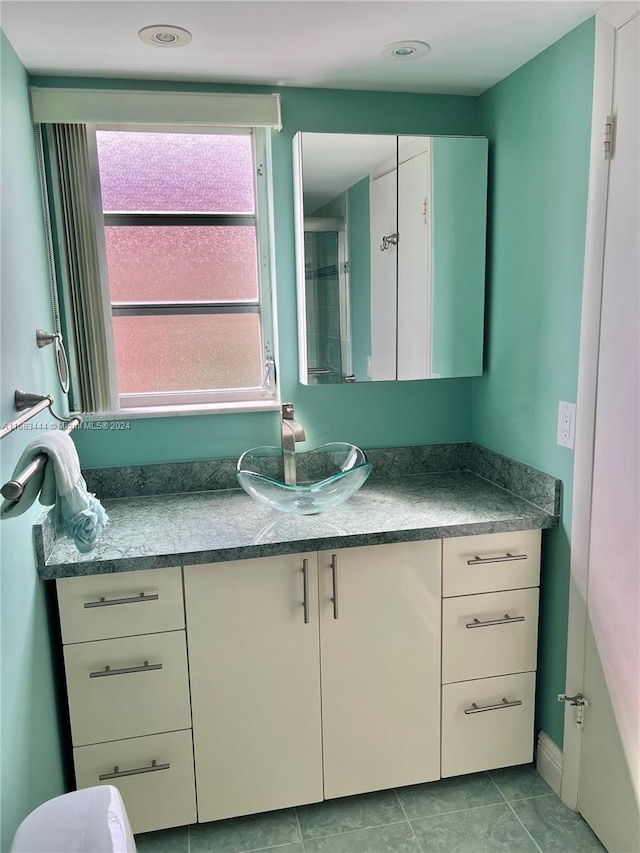 bathroom featuring vanity and tile patterned floors