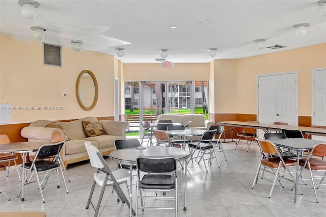 dining room with light tile patterned floors