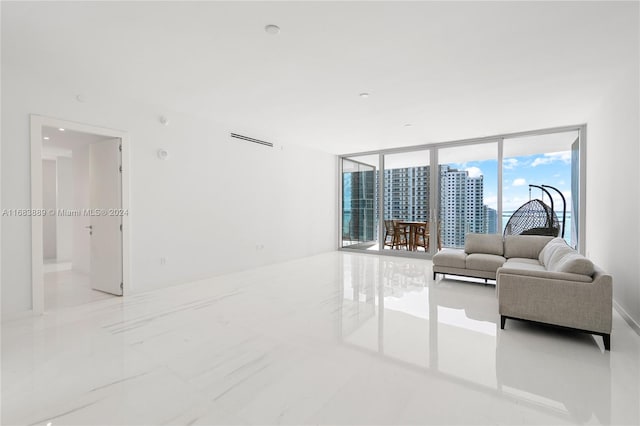 living room with a wall of windows