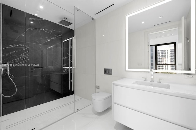 full bathroom featuring a marble finish shower, toilet, marble finish floor, vanity, and tile walls