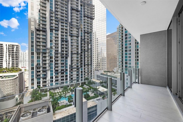 balcony featuring a city view