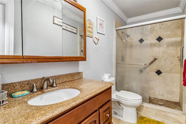 bathroom with a shower with shower door, toilet, vanity, ornamental molding, and tile patterned flooring