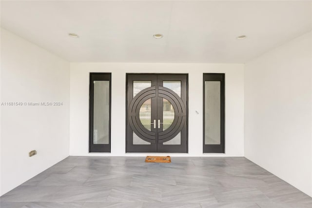 entryway featuring french doors