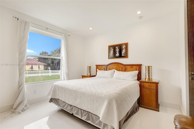 bedroom featuring light tile patterned flooring