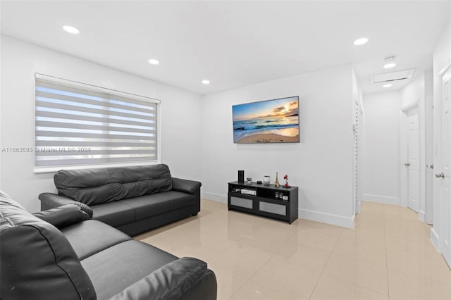 living room with light tile patterned floors