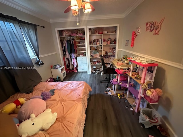 bedroom featuring dark wood-type flooring and ornamental molding