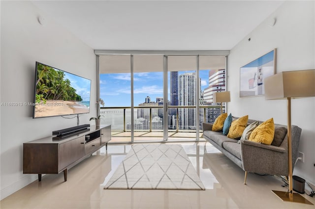 tiled living room with expansive windows and plenty of natural light