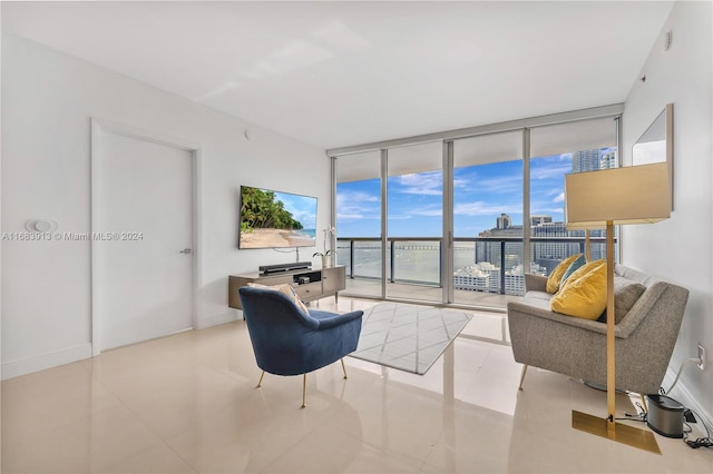 tiled living room with expansive windows