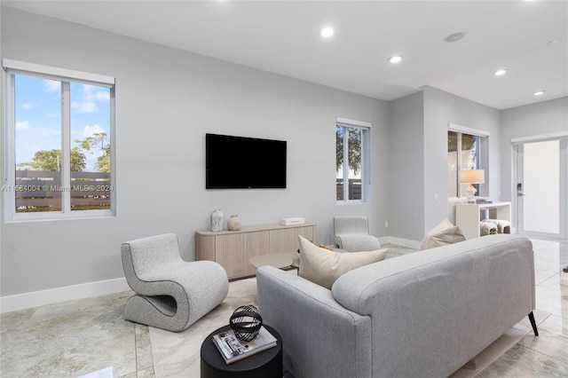 living room featuring a wealth of natural light