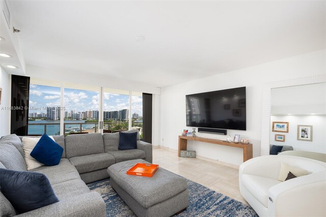 living room with floor to ceiling windows