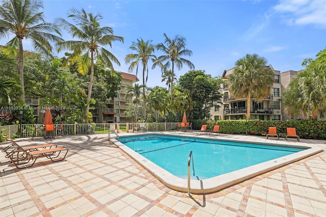 view of swimming pool featuring a patio area