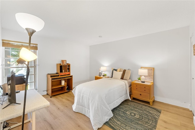 bedroom featuring light hardwood / wood-style floors