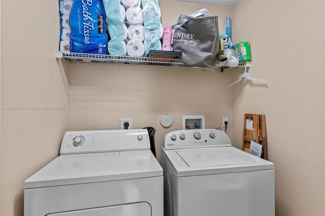 laundry area with washer and clothes dryer