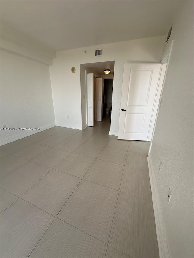 2301 SW 27th Ave Unit 1202, Miami, FL 33145 - empty room with baseboards