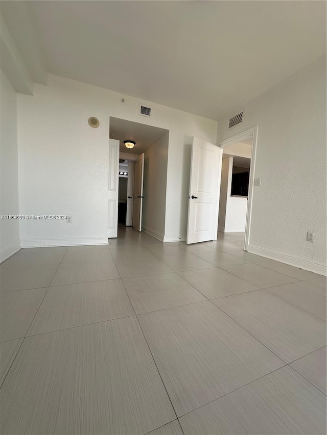 2301 SW 27th Ave Unit 1202, Miami, FL 33145 - unfurnished room featuring baseboards
