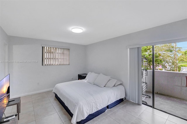 tiled bedroom with access to outside