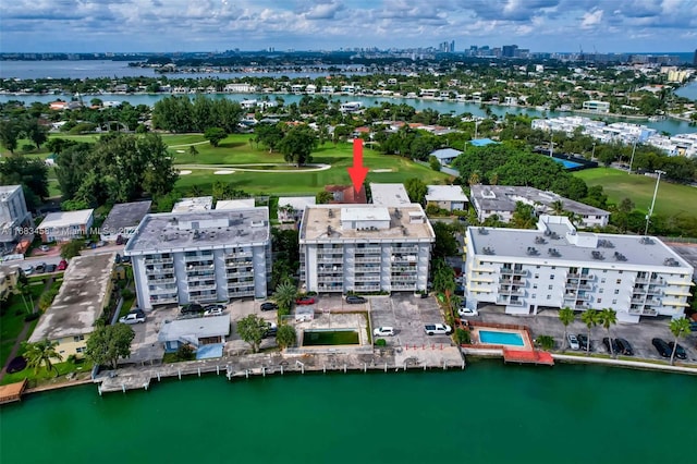 birds eye view of property featuring a water view