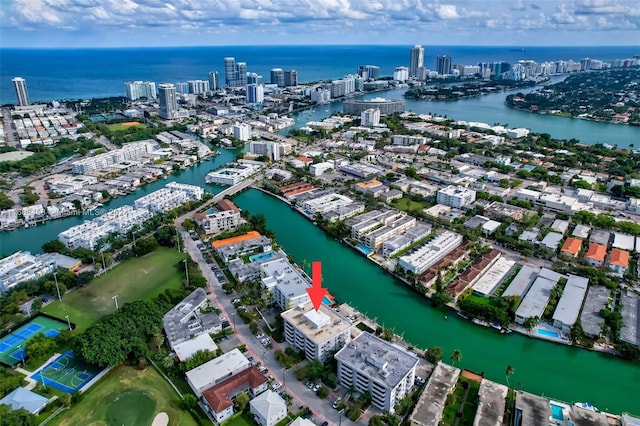 birds eye view of property featuring a water view