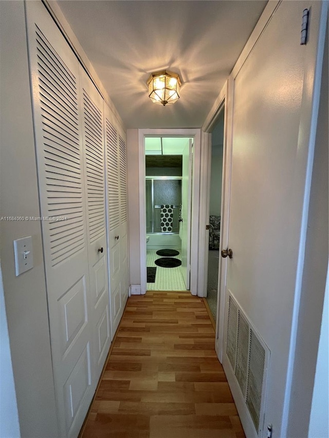 hallway featuring light wood-type flooring