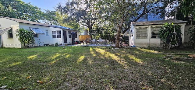 view of yard with a patio area