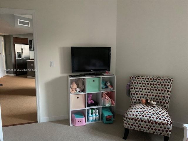 game room with carpet flooring