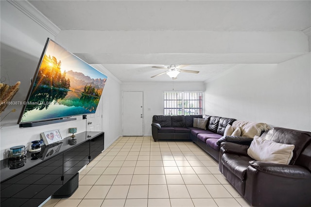 living room with ceiling fan, light tile patterned floors, and crown molding