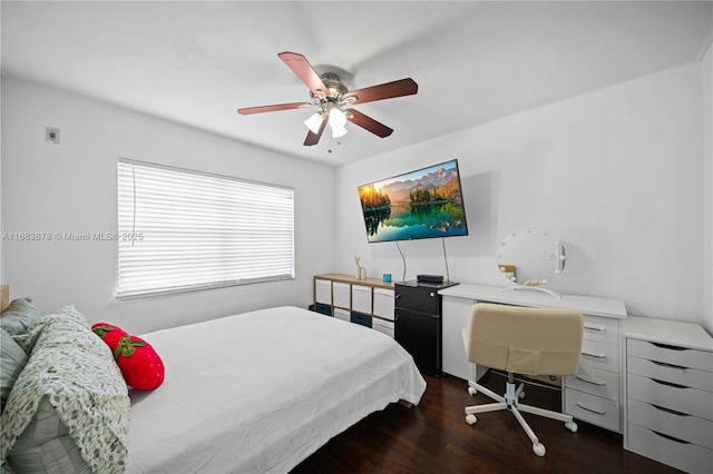 bedroom featuring ceiling fan and dark hardwood / wood-style floors