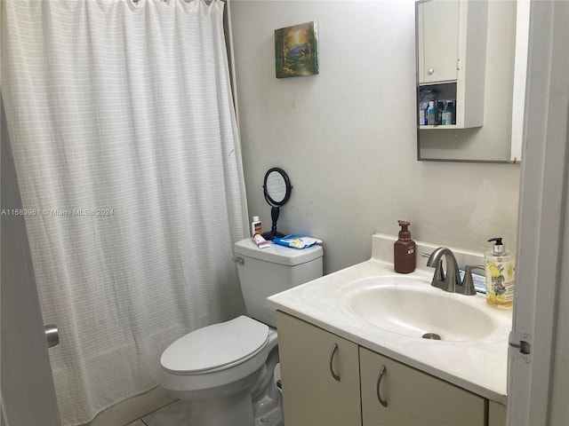 bathroom featuring a shower with shower curtain, tile patterned floors, vanity, and toilet