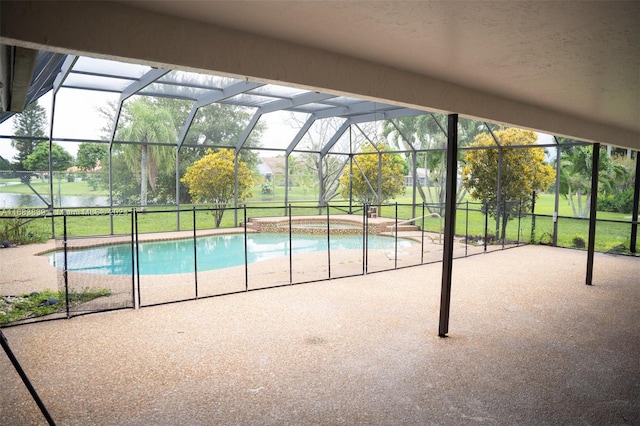 view of pool featuring a patio, a lanai, a water view, and a yard