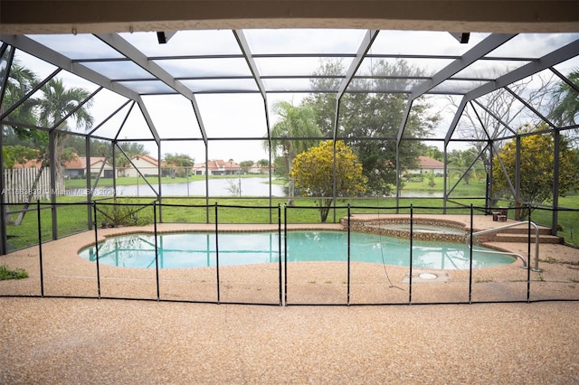 view of pool with a patio, an in ground hot tub, a water view, and glass enclosure