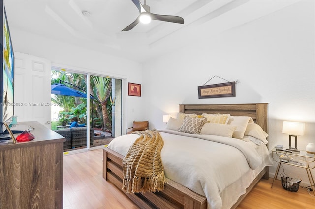 bedroom with ceiling fan, light hardwood / wood-style floors, and access to exterior