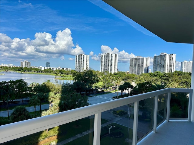 balcony featuring a water view