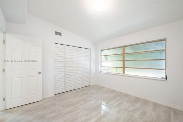 kitchen featuring white cabinets, appliances with stainless steel finishes, sink, and light hardwood / wood-style flooring