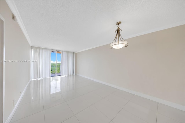 unfurnished room featuring crown molding, a textured ceiling, and light tile patterned floors