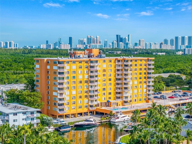 property's view of city with a water view