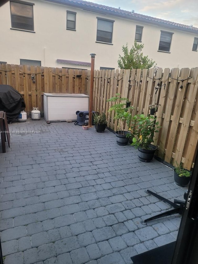 view of patio / terrace with fence