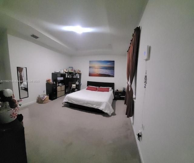 carpeted bedroom with visible vents