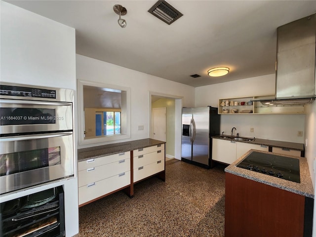 kitchen with white cabinets, sink, and appliances with stainless steel finishes