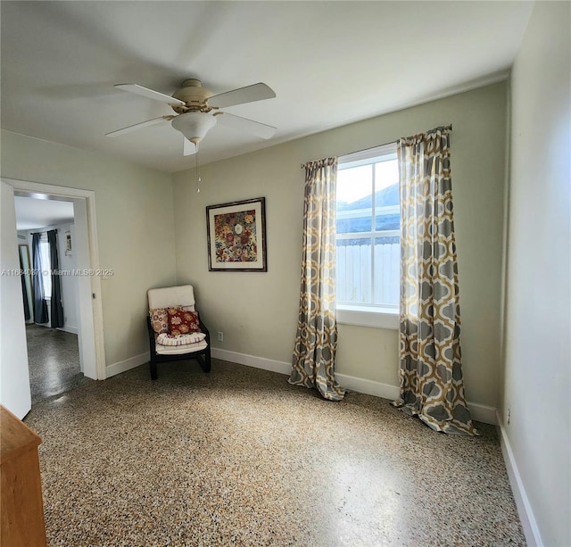 unfurnished room with ceiling fan