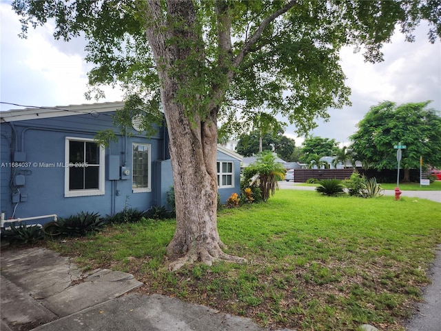 view of home's exterior featuring a lawn