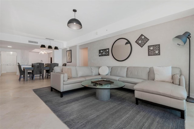 living room with light tile patterned flooring