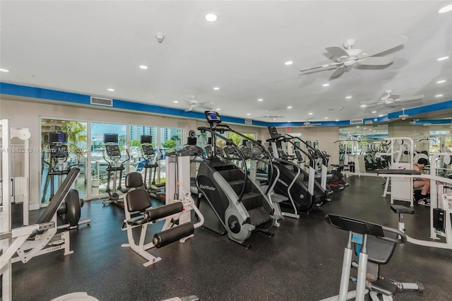 exercise room with ceiling fan