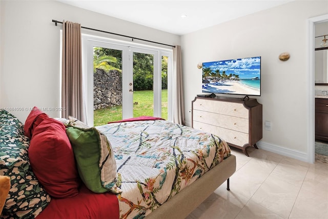 bedroom with french doors and ensuite bath