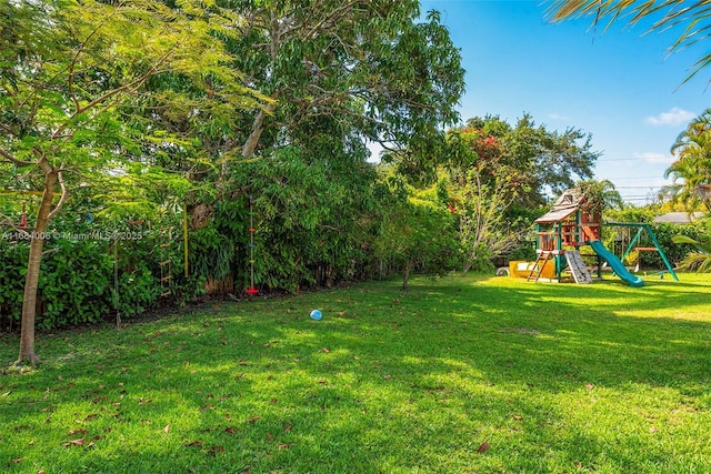 view of yard with a playground