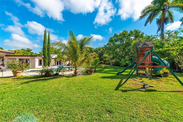 view of yard with a playground