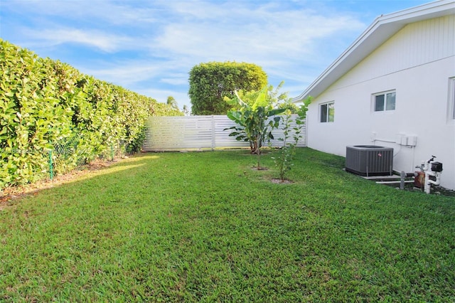 view of yard featuring central AC