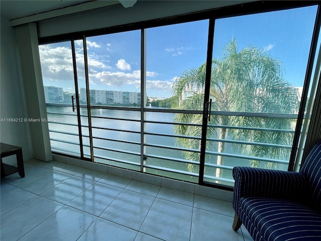 interior space featuring a water view and a wealth of natural light