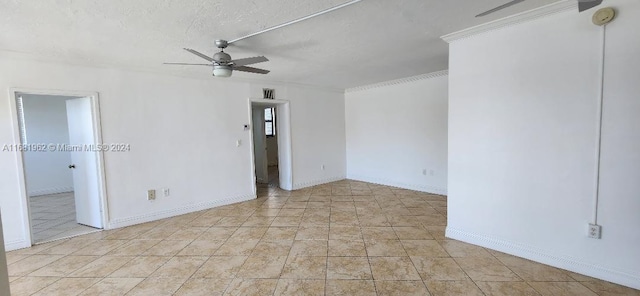 spare room with ceiling fan